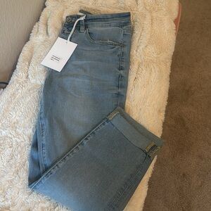 Elevate your everyday style with these low rise cuffed cropped skinny jeans.